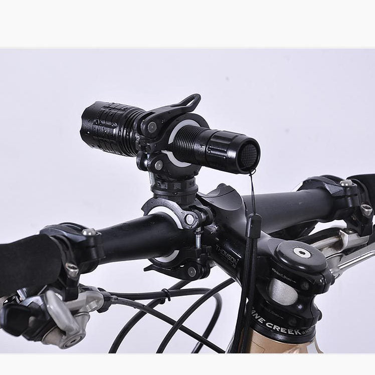 SYSTEM-S bicycle mount attachment in black and white for lamp bicycle pump