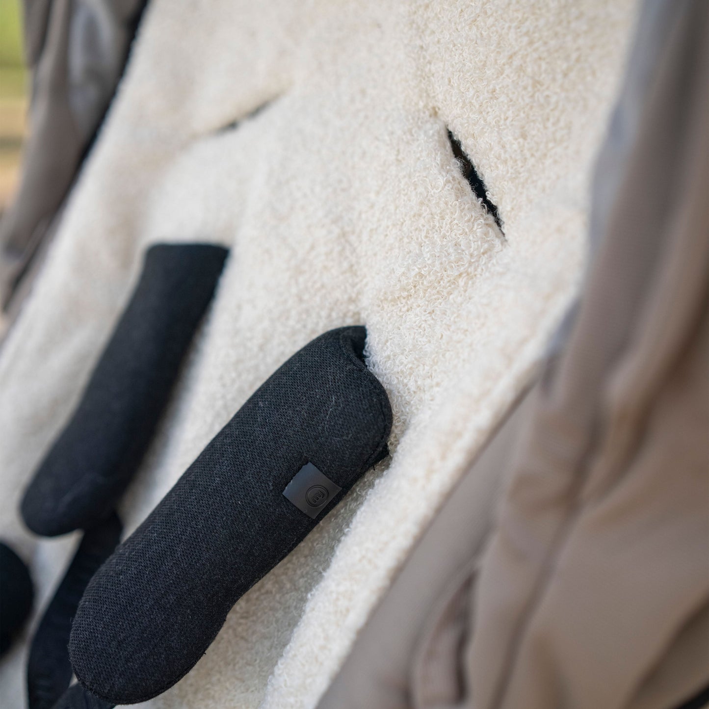 Sitzauflage Teddystoff Boucle für den Kinderwagen - universell passend