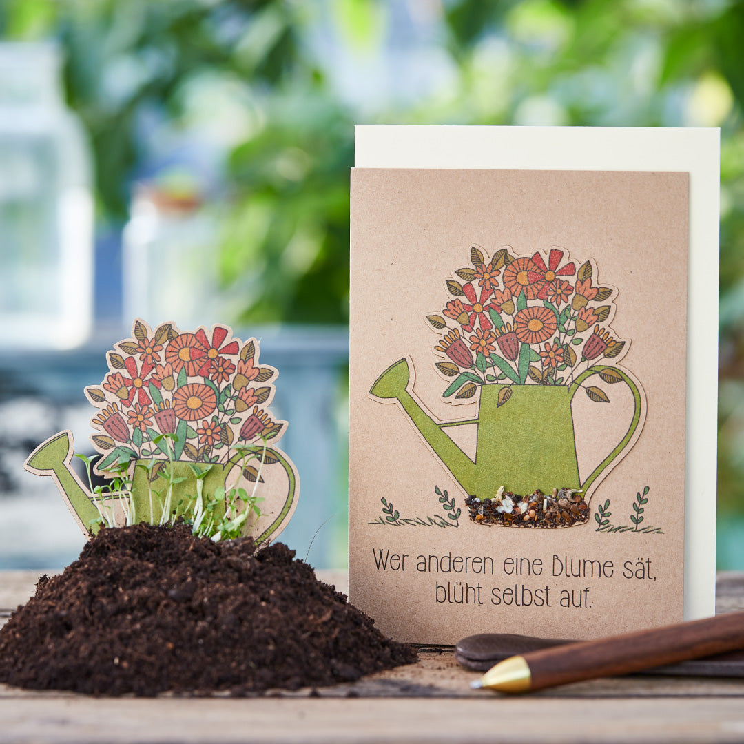 Greeting card "He who sows a flower for others" 