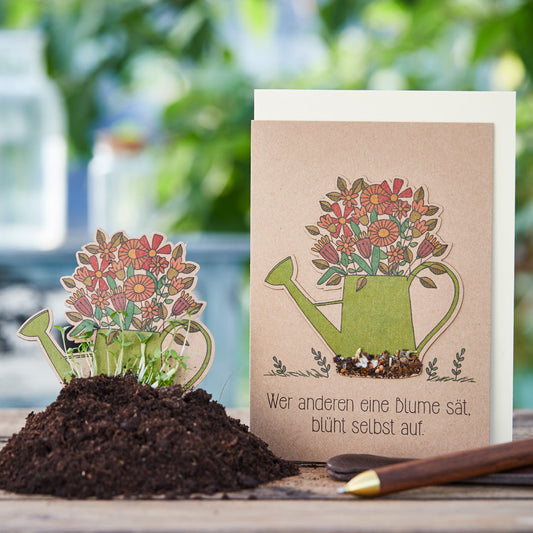 Greeting card "He who sows a flower for others" 