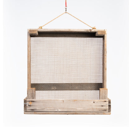 Narrow garden shelf made from onion sieve
