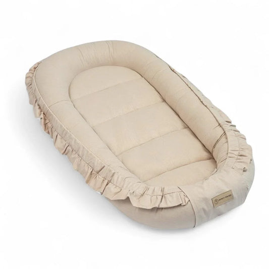 Baby nest cotton ruffles – playful, growing baby cocoon