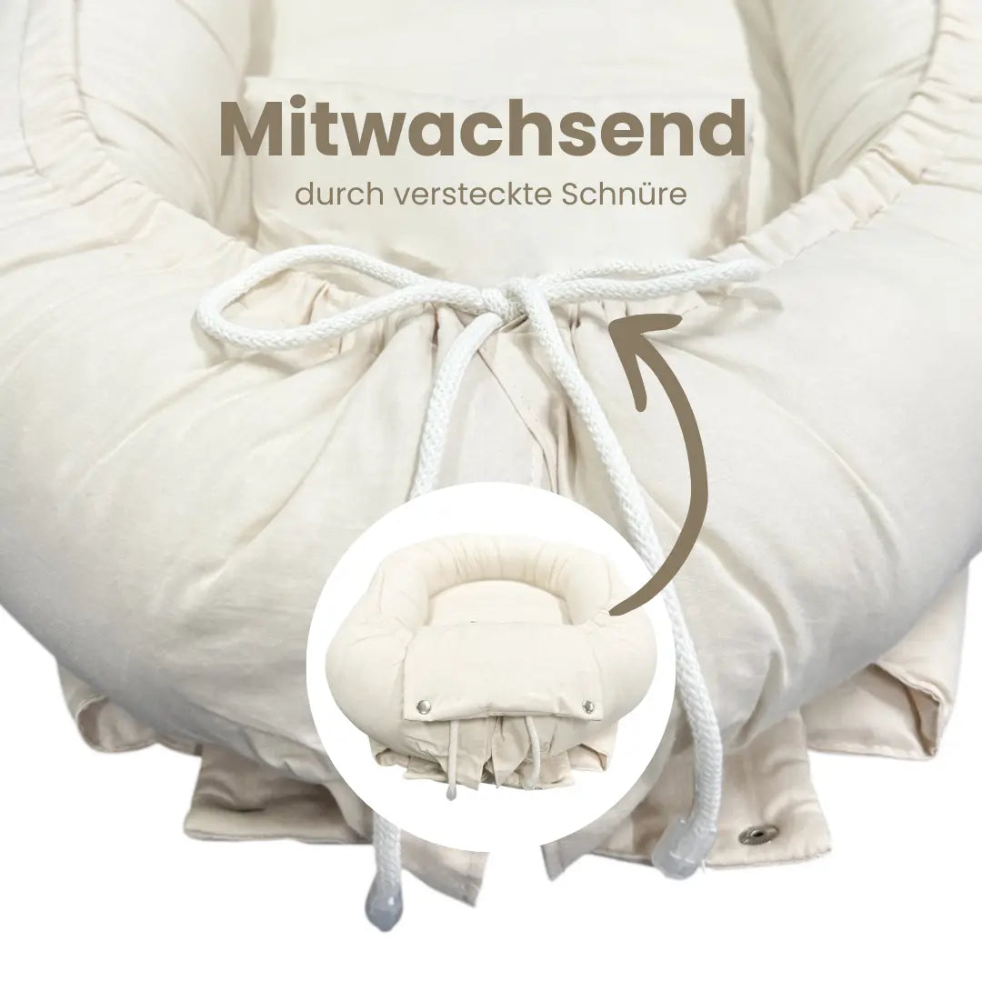 Babynestchen Baumwolle Rüschen – Verspielter mitwachsender Baby-Kokon